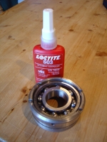  bearing pressed into carrier and retained with locking compound